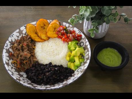 Pabellon bowls are considered Venezuela’s national dish and a must-try at Arepa House. 