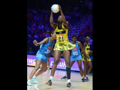 
Jamaica’s Romelda Aiken catches the ball during their Vitaly Netball World Cup game against Fiji at the M&S Bank Arena in Liverpool, England, in 2019. 