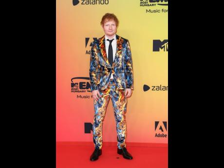 Fresh off his announcement in an interview that he’s working on a collaboration with Ishawna, Ed Sheeran turned heads on the red carpet of the European MTV Awards in Budapest, Hungary, on Sunday. 
