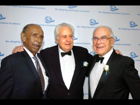  From left: Robert Bell with friends and industry titans Paul Scott and Geoffrey Collyer.
