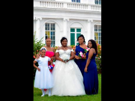 Monique was excited to be joined by her wonderful bridesmaids. From left: Flower girl Junique Daley; maid of honour Trecia Boothe, and bridesmaids Shanice Reid and Natalia Reid.