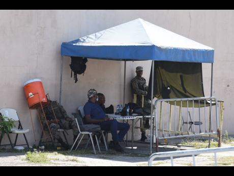 Members of the Jamaica Defence Force and the Jamaica Constabulary Force have complained that they are forced to work without simple necessities like a toilet facilities an electrical source to charge their phones while monitoring checkpoints under the stat