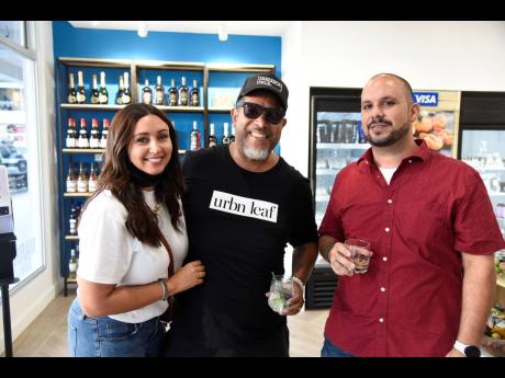 From left: Melissa Wilson, managing director of Mel’s Sticky Jam; entertainment impresario and new author Steve ‘Urchin’ Wilson; and Victor Handal, director of Kohler Jamaica, were all smiles at the launch.