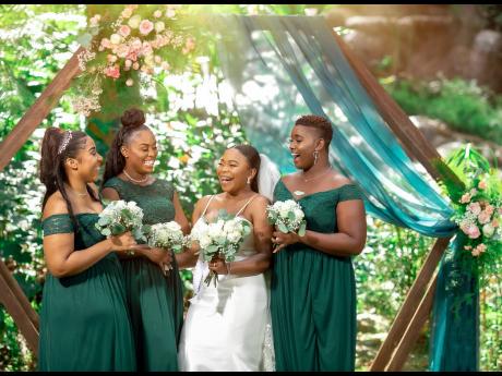 Laughter is like food for this bride tribe. From left:  Shanai Crosdale, bridesmaid and bride’s cousin; maid of honour Britney Graham; bride Kimberley Dockery; and Camise Dockery, bridesmaid and sister of the groom. 