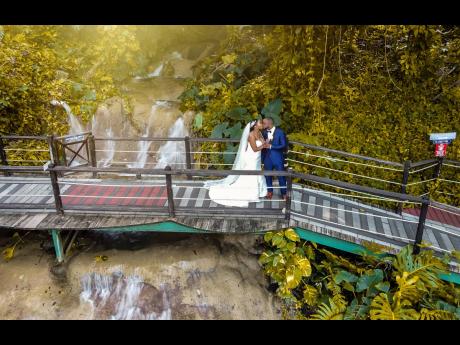 The Konoko Falls provided the beautiful canvas for what could be a picture-perfect painting for newly-weds Kimberley and Gary Dockery.