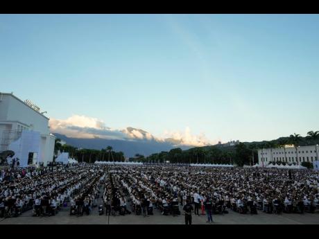 Members of the National Orchestra System play a 12-minute Tchaikovsky piece to try and break a Guinness World Record in Caracas, Venezuela on Saturday, November 13, 2021. 