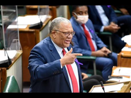 Dr Peter Phillips, member of parliament for St Andrew East Central, making his contribution to the Constituency Debate in Gordon House in Kingston during Tuesday's parliamentary sitting.