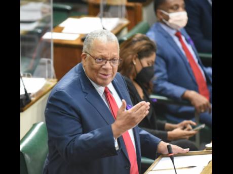 Dr Peter Phillips, member of parliament for St Andrew East Central, making his contribution to the State of the Constituency Debate in Gordon House in Kingston during Tuesday’s parliamentary sitting.