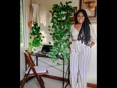 Shauntelle Henry believes every desk should have one plant, or more to boost your mood.