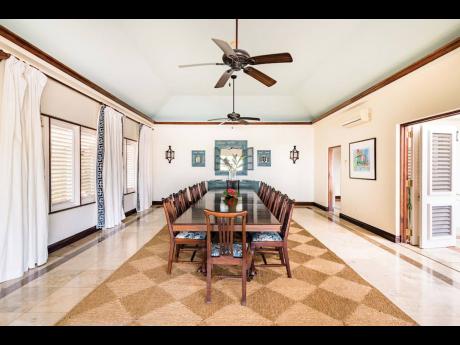 This is a size dining room you don’t see every day. It holds an 18-seater dining table, and is fully air-conditioned.