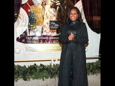 Michelle Obama at the launch of the Saks x Obama Foundation’s holiday windows.