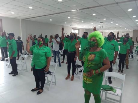 Labourites participate in the JLP annual conference from a remote location at the James Hunter Event Centre in Negril, Westmoreland, on Sunday.