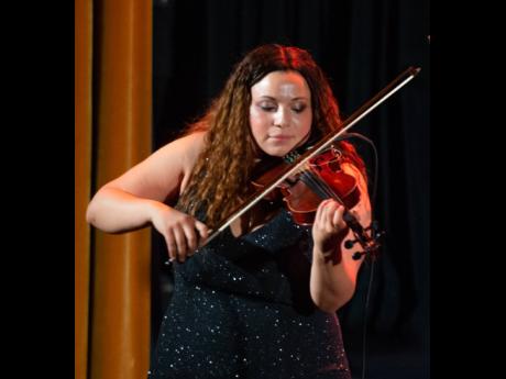 International Women In Reggae violin player, Tova Harris, at the Westchester Music Experience last Friday.