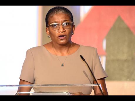 Dr Jennifer Brown Tomlinson, medical director, Jamaica AIDS Support for Life speaks at the HIV public forum, held at the Jamaica Pegasus Hotel, New Kingston on Tuesday. 