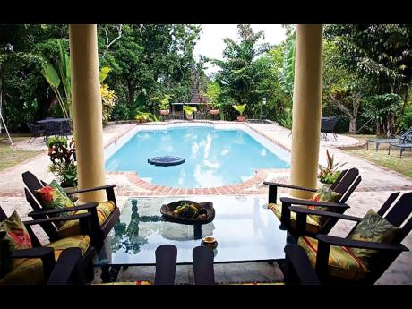A delightful garden swimming pool setting.