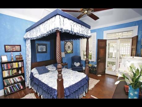 All bedrooms display fanciful four-poster canopy beds.