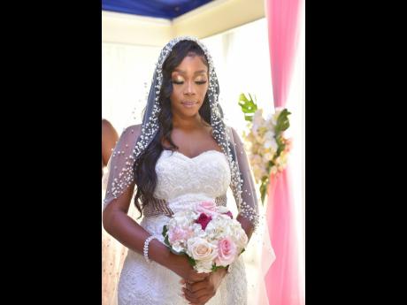  The beautiful bride taps into her spiritual side during the formal proceedings.