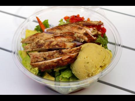 A light salad bowl, with jerk or grilled chicken, avocados, lettuce, potato salad and tomato salsa is good for someone who is always on the move and easy to build. 