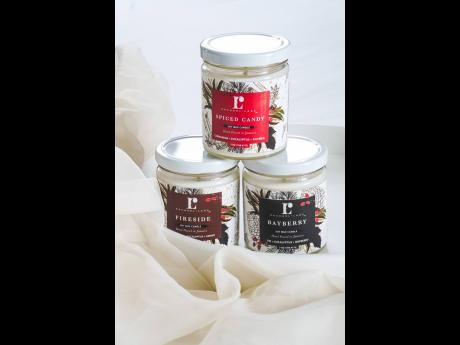 Soy wax candles in holiday scents from the Rachael Lane Holiday Collection.
