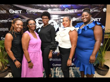 From left: Venessa Campbell, Gilda Williamson, Lisa Burton-Brown, Dianne Burnett-Clarke and Amy Powell  at the Jamaica  Co-operative Credit Union League ‘Celebration of the Stars’ long service awards ceremong at The Jamaica Pegasus hotel in New Kingsto