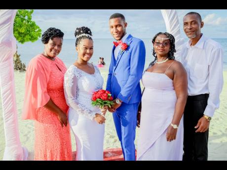 The lovely newlyweds are joined by their parents (from left): mother of the bride, Lenora Lewis, mother of the groom Charmaine Jones and father of the groom, Dave McFarlane.