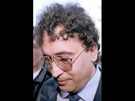 
Lamen Khalifa Fhimah, shown above in a February 18, 1992 file photo, and co-defendant, Abdel Basset Ali al-Megrahi, were accused of planting the suitcase bomb that blew up a passenger jet over Lockerbie, Scotland, on December 21, 1988, killing 270 people.