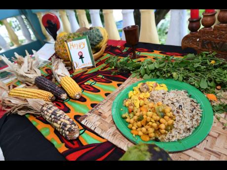 The typical outlay of food and fruits on a table as part of celebrating Kwanza.