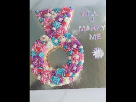 Make it a sweet proposal with this cookie cake covered with Swiss meringue buttercream.