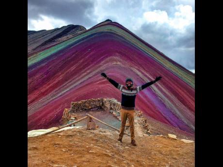 After a steep and rough climb, The Witty Traveller captures his accomplishment in Vinicunca, or Winikunka, also called ‘Rainbow Mountain’, a mountain in the Andes of Peru with an altitude of 5,200 metres or 17,100 feet.  