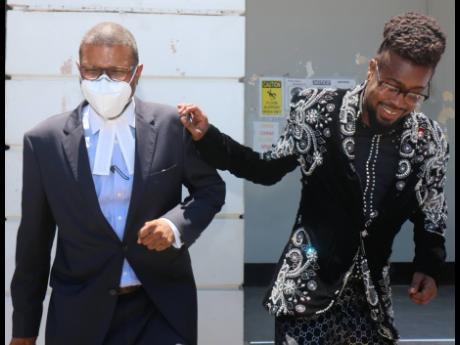 Moses Davis (right), more popularly known as dancehall artiste Beenie Man, and his attorney, Roderick Gordon, leave the St Elizabeth Parish Court on May 17, 2021 after following an appearance relating to breaches of the Disaster Risk Management Act.