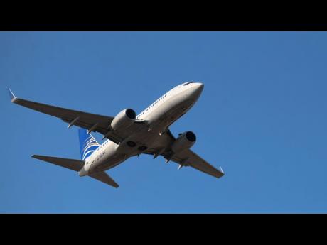 The Copa Airlines flight on which Mario Antonio Palacios, a suspect in the July 2021 murder of Haitian President Jovenel Moise, was believed to be travelling is seen departing from the Norman Manley International Airport in Kingston as he was deported to C