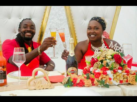 Askala Selassie (right), and her husband, Marlon Dale, during their Fairfield House nuptials. 