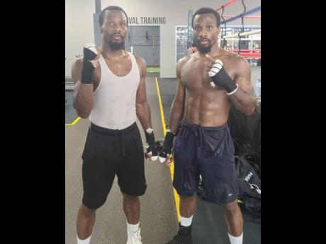 Boxing twins Trevor and Chann Thonson.