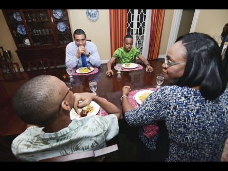 File 
In this 2018 Gleaner file photo, Prime Minister Andrew Holness and his wife, Juliet, enjoy some family time with sons Adam and Matthew at Vale Royal, the official residence of the prime minister.