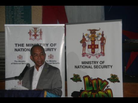 
Minister of National Security Dr Horace Chang addressing stakeholders at a meeting at The Manning’s School in Savanna-la-mar, Westmoreland, last Thursday.