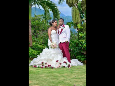 Tavia and O’Shane take their official photo as husband and wife.