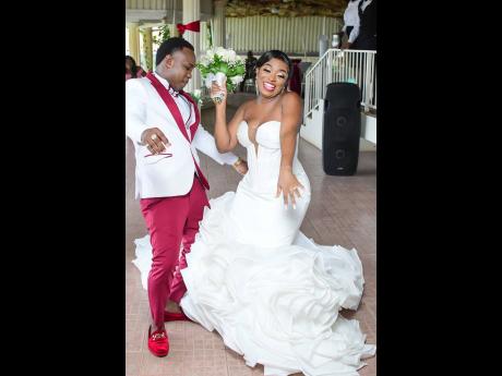 The newlyweds dance together for the first time as husband and wife. 