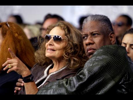 Fashion designer Diane Van Furstenburg (left) and Vogue editor at large André Leon Talley attend a fashion show on September 14, 2010, in New York. 