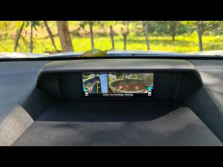 Mini screen showing the images from the side and front view cameras. 