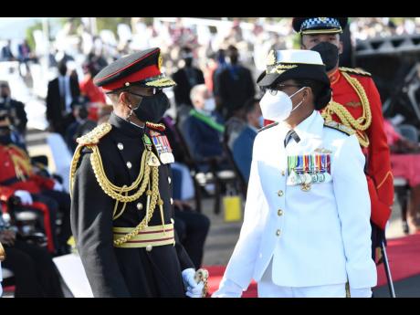 Incoming chief of defence staff, Rear Admiral Antonette Wemyss Gorman (right), chat with outgoing chief of defence staff, Lieutenant General Rocky Meade, during the change of command parade on Friday.