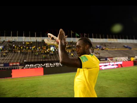 Michail Antonio, the scorer of a brilliant goal for Jamaica against the United States during their Concacaf World Cup qualifying match on Tuesday, November 16, 2021 at the National Stadium, saluting the fans at the end of the game. The game ended in a 1-1 