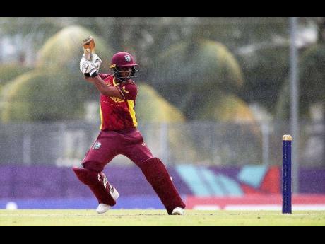 Matthew Nandu scores through the off-side during his hundred against Papua New Guinea in the Plate quarterfinals of the ICC U19 World Cup in Port-of-Spain, Trinidad, yesterday.