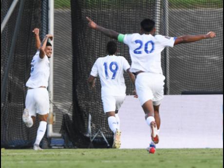 Panama players celebrate the team’s opening goal against Jamaica during their September 5 meeting at the National Stadium in Kingston, Jamaica. From left are: goalscorer Andrés Alberto Andrade, Alberto Quintero, and Aníbal Cesis Godoy.