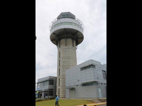 The air traffic control tower at Norman Manley International Airport. Apparent industrial action by air traffic controllers at Sangster International Airport caused the cancellation of flights Sunday night. 