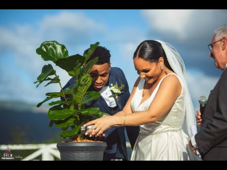 The couple engaged in a tree planting ceremony to the soothing sounds of Elevation Worship’s ‘The Blessing’ featuring Kari Jobe and Cody Carned, sung live by Trinelle Robinson.