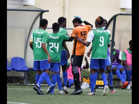 Montego Bay United’s players celebrating a goal during their Jamaica Premier League encounter against Molynes United at the UWI-JFF Captain Horace Burrell Centre of Excellence yesterday. Montego Bay United won 4-1. 