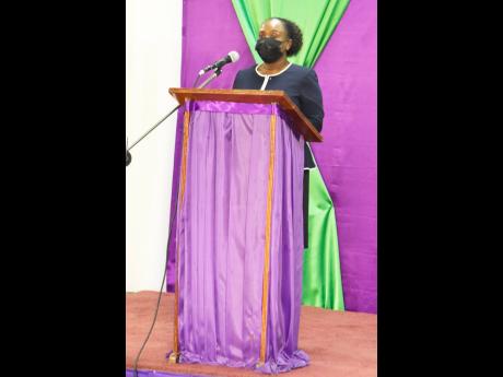 Maureen Thompson, director general, Jamaica Library Service, makes her remarks at the Jamaica Library Service Career Forum, held at Joyce Robinson Hall, Kingston and St Andrew Parish Library, on Monday. 