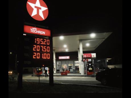 A motorist leaves the Texaco service station in Cross Roads, St Andrew. Fuel prices have soared in recent weeks.