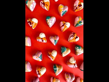  Say I love you with an assortment of heart-shaped chocolate bonbons. 