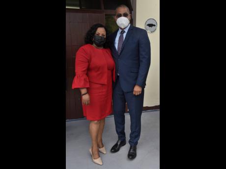 Natalie Neita-Garvey (left), member of parliament for St Catherine North Central, and Mikael Phillips, member of parliament, Manchester North Western. 